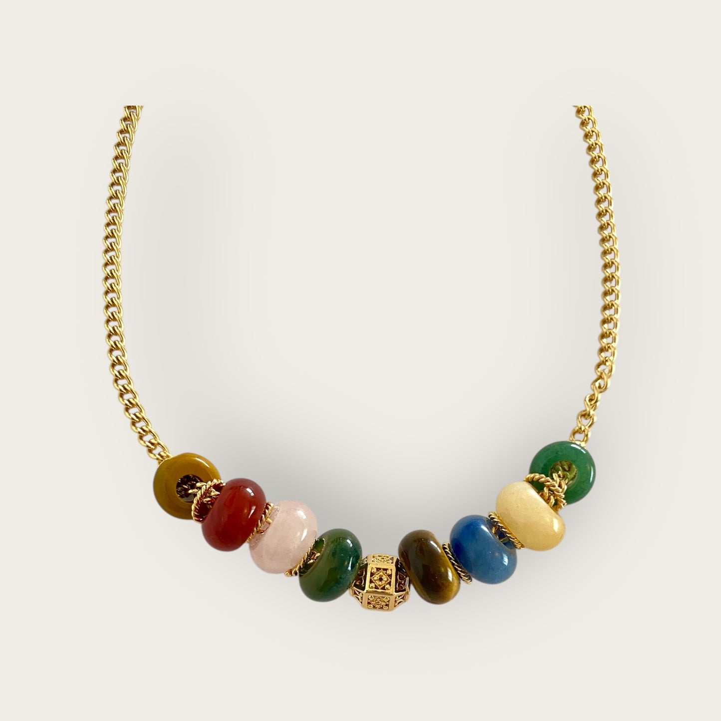 Necklace with gemstone doughnuts