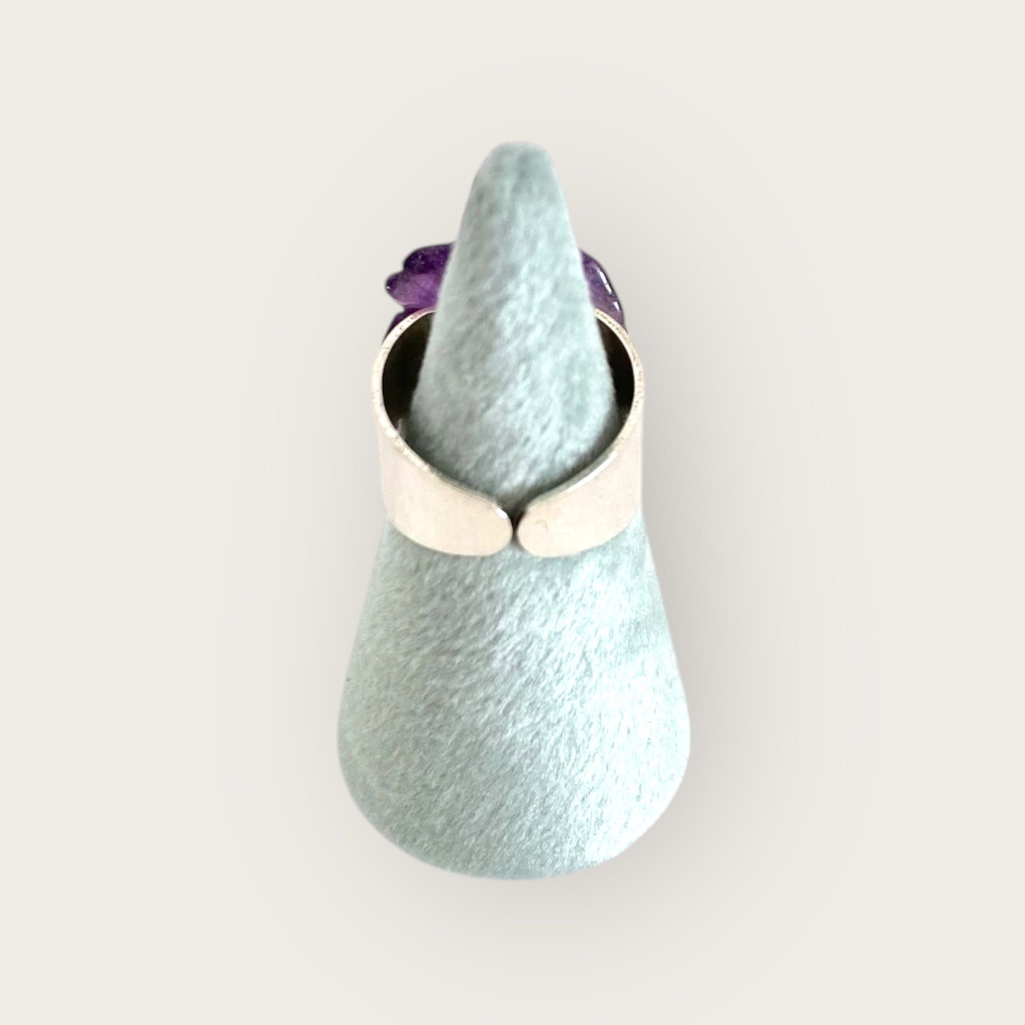 Silver pinky ring with carved amethyst flower