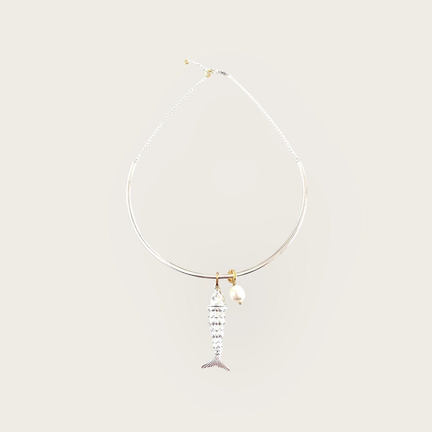 Silver choker with fish and pearl
