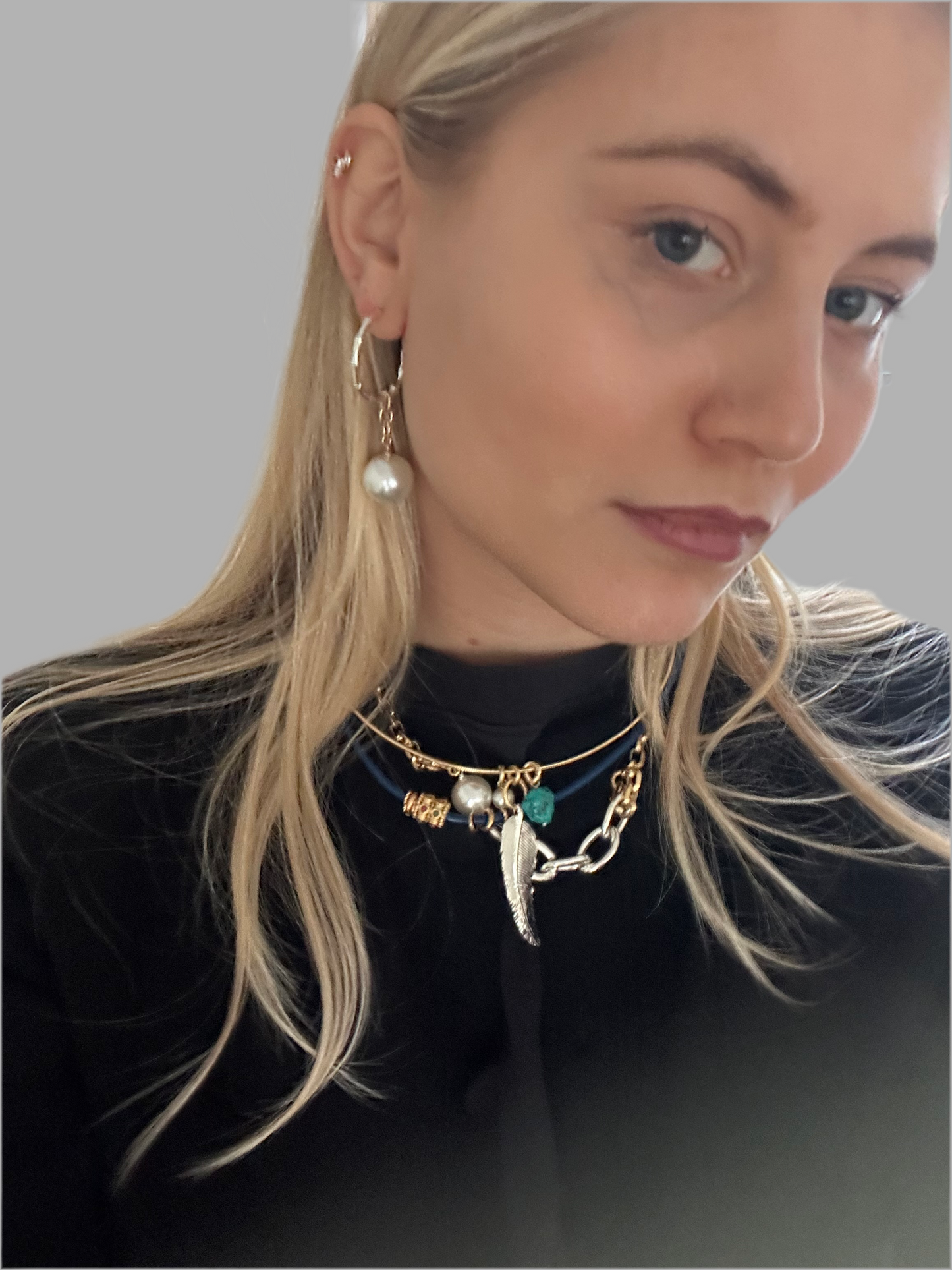 Necklace with feather and turquoise pendant