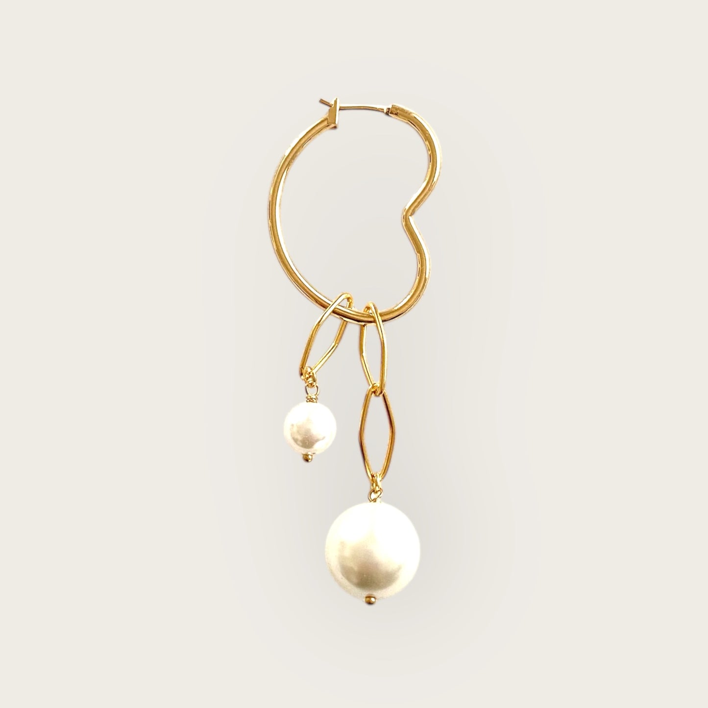 single heart earring with pearls