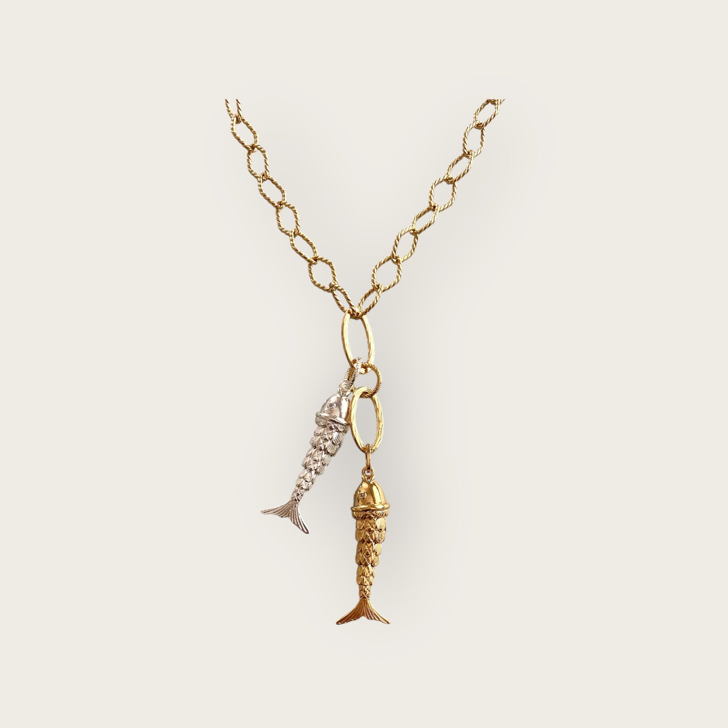 The Gold & Silver Fish necklace