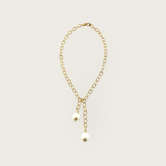 Necktie with peals