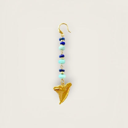 Single earring with tooth