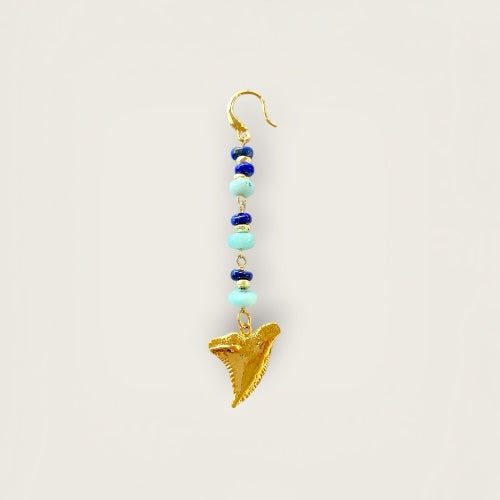 Single earring with tooth