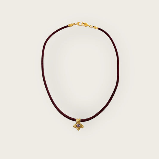 Burgundy cord with flower pendant