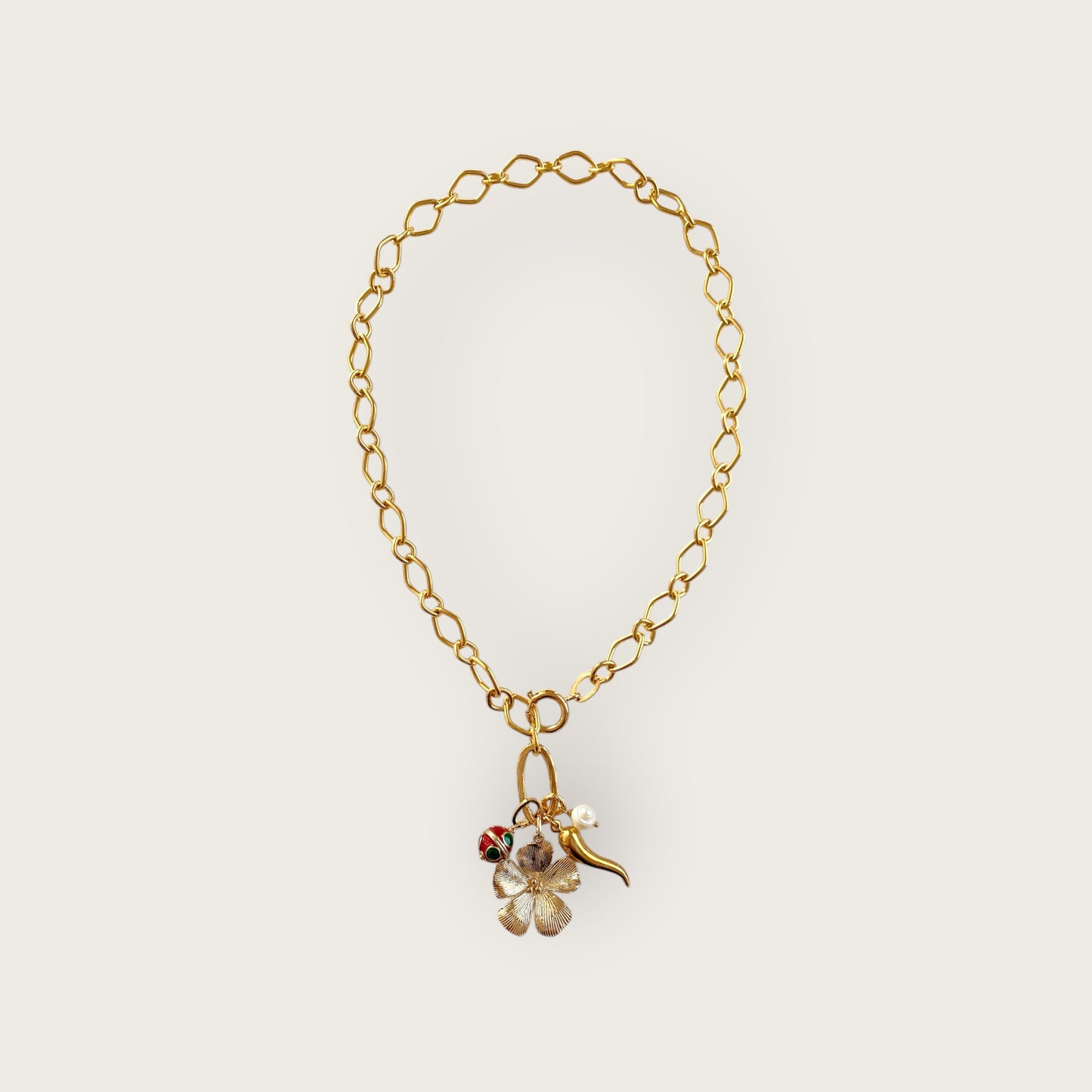 Necklace with flower and charms