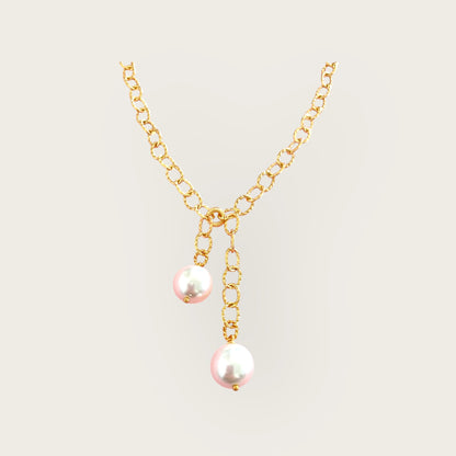 Necktie with peals