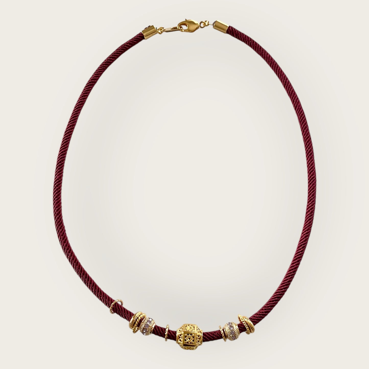 Burgundy cord with charms