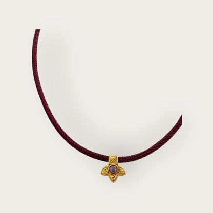 Burgundy cord with flower pendant